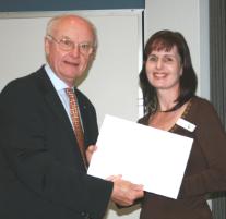 PhotoID:7469, Professor Rickard congratulates Dr Susan Rockloff on her research achievements