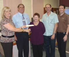 PhotoID:5180, from left Karen Reynolds - DTLS, Bill Watson from Brisbane, CEO of Childhood Cancer Support, Jenny Hilcher the local representative of the organisation, Gary Reynolds - Queensland Rail, Greg Muir - Student System Upgrade Project