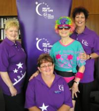 PhotoID:5507, CQU Deputy Vice-Chancellor Angela Delves lends encouragement to Relay promoters Ros Bedward (committee chair), Esther Black (from the Cheeky Cheerleaders team) and Gail Imhoff (project officer)