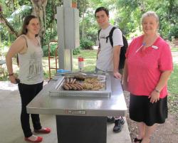 PhotoID:13015, Aussie IT student Joseph Alley meets History student Ceri Matthews-Henry, from Britain, and International  Administrative Officer Tanya Rogers at the barbecue