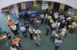 PhotoID:10392, Delegates network during a break in the conference