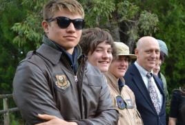 PhotoID:12799, Senior lecturer Ron Bishop stands shoulder to shoulder with budding aviation professionals from Caloundra High School