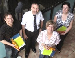 PhotoID:10174, Professor Rob Reed (centre) congratulates academics who excelled in ensuring student satisfaction and course evalution rates L-R Clinton Hayes (Transition Maths 1), Ingrid Kennedy (Computing for Academic Assignment Writing) and Dr Tania Signal (Learning)