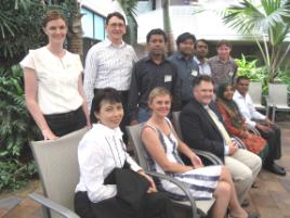 PhotoID:10123, IRIS conference organisers (seated L-R) Dr Anna Thomas, Dr Christelle Catuogno and Professor Richard Clegg with some of the research student participants