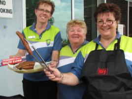 PhotoID:6833, Julie Reading, Carol Ryan and Karin Simons from the CQUniversity Gladstone Cyril Golding Library dish up more than just books and knowledge to students at 'O' week