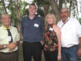 PhotoID:8655, Donor Paul Andersen congratulates Mitchell Lees on winning a Fund for Accessing Potential Expertise prize, alongside proud parents Kerry and Barry