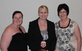 PhotoID:13409, Rayleen (centre) is congratulated by Jessie Phelan and Gai Sypher from Emerald Learning Centre