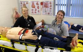 PhotoID:12043, Prue Farquhar (left) and Lauren Newman in the Paramedic Science labs at CQUniversity Rockhampton