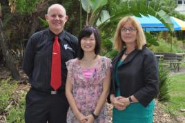 PhotoID:14179, Angela is congratulated by VC Scott Bowman and Deputy VC Hilary Winchester