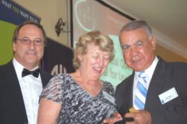 PhotoID:6323, Professor Kevin Tickle and Beth Tennent congratulate Bob Blair at the AIM awards