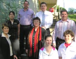 PhotoID:4535, Jillian Litster (red scarf) with visiting Tourism leaders and Emerald State High students Tahnee Jarvis and Calan Dunbar, both Year 10