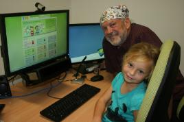 PhotoID:10688, Azalia Frisby pictured, with Associate Professor Mike Horsley is one of the first students to use the eye tracker which could revolutionise the way we approach the production of learning materials in classrooms.