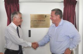 PhotoID:10504, Agriculture, Food and Regional Economies Minister and Member for Mackay Tim Mulherin (right) officially opens the complex with help from Chancellor Rennie Fritschy