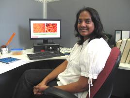 PhotoID:8729, Vineela Challagulla checks her research presentation