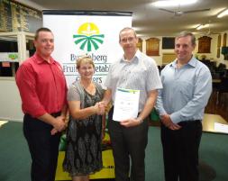 PhotoID:13632, CQUni's Professor Phil Brown (second from right) discusses the scholarship with BFVG Executive Officer Peter Hockings (red shirt), Edwin's widow Kay Tesch and Rodney Griffith, the Premier Fruits Group, National Accounts Manager