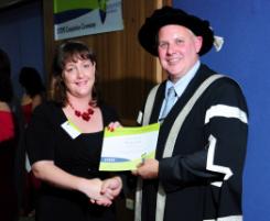 PhotoID:9838, Shauna accepts her STEPS completion certificate from Vice-Chancellor Professor Scott Bowman. Photo courtesy Craig Chapman Photography