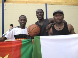 PhotoID:8793, Basketball participants Richard Bezankeng (from Cameroon), Chol Mayen (from Sudan) and Mike Akpughe (from Nigeria)