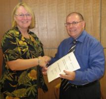 PhotoID:4049, CQU's Professor Elizabeth Taylor with Anglicare CEO for Central Queensland, Tony Stevenson 