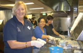 PhotoID:13233, Professor Ysanne Chapman helps out assembling birthing kits