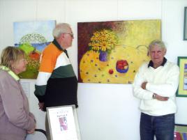 PhotoID:6015, Liz Huf, Brian Kehoe and Bruce Wardell with a Dell Nash artwork.