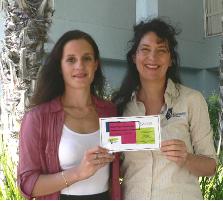 PhotoID:13341, Maria is pictured receiving the GRC Bursary from Helen Holden (Head of Program for STEPS)