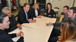 PhotoID:12583, Senator Evans discusses the benefits of the new library with current CQUniversity students, Professor Jennelle Kyd and Member for Capricornia Kirsten Livermore MP