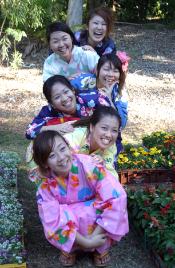 PhotoID:4514, Japanese students display their beautiful smiles and kimonos at last year's CQU Multicultural Fair and Open Day.