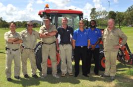 PhotoID:14348, Preparing the fields for the Carnival are Paul Arscott, Brian McInnes, Wayne Thomas, John Saunders and (far right) Scott Lynch from Facilities Management with (light blue shirts) Justin Loomins and Daniel Yasso from CQID