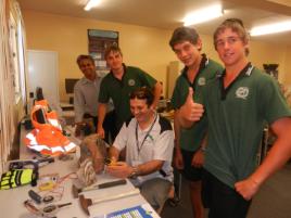 PhotoID:14283, CQUniversity's Senior Lecturer in Engineering Dr Arun Patil (left) with Senior Lecturer in Geoscience Dr Andy Hammond (centre) talk geology with Calen State High School students Lane Wales, Reagan Laird and Will Munchow.