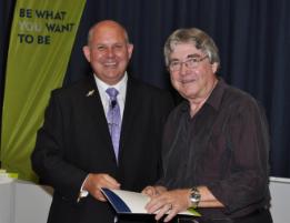 PhotoID:11807, Ron Wallis accepts his 35-year service award from VC Professor Scott Bowman