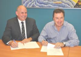 PhotoID:9020, Vice-Chancellor Professor Scott Bowman joins Terry Agnew of GKI Resort Pty Ltd for the MOU signing