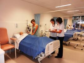 PhotoID:13513, Merinda Maritz, Kahla Edwards and Vicki Mulley demonstrate skills on new Nursing and Midwifery equipment. 