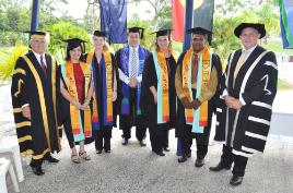 PhotoID:10512, Chancellor Rennie Fritschy (left) and Vice-Chancellor Scott Bowman (right) congratulate Indigenous graduates L-R Lisa Preece (learning management); Leah Thinee (learning and teaching); Jonathan Oates (MBA Marketing); Natasha Kann (social work) and Cedric Priestley (arts)