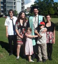 PhotoID:13527, Alain with family members celebrating his graduation from CQUniversity in mid-2011