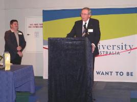 PhotoID:6011, Head of Campus Dr Pierre Viljoen (left) watches an address by long-serving advisory committee member Tony Goodwin