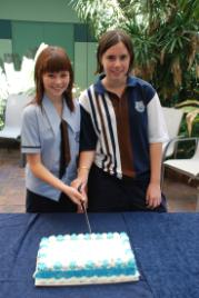 PhotoID:6285, Rockhampton High School students Courtney Gordon and Natalie White celebrate the conclusion of the TAP program.