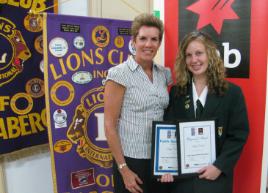 PhotoID:12059, Professor Helen Huntly congratulates Lions Youth of the Year winner Amy Collins.