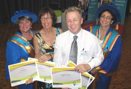 PhotoID:8652, Nursing academics Dr Kerry Reid-Searl (left) and Dr Trudy Dwyer (right) congratulate multiple prize winners Lea Vieth and Matthew Daley. Matthew was also guest speaker for the evening