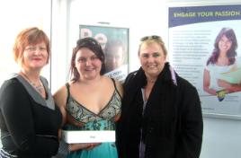 PhotoID:12743, iPad winner Rhiannon Schmidt (centre) is congratulated by Karen Seary, Associate Dean, Academic Learning Services Unit (left) and Hermina Conradie, the Access Coordinator for ALSU on the Bundaberg Campus  