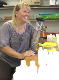 PhotoID:8069, Leigh Stitz with some of her research equipment