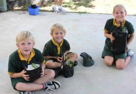 PhotoID:11902, Banana Primary students display their pots