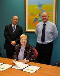 PhotoID:8617, CQUniversity's Jansci John Mark with Vice-Chancellor Scott Bowman and Deputy Vice-Chancellor Angela Delves at the signing of the MOU with Hungary's Miskolc University.