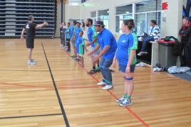 PhotoID:12664, Postgraduate exercise and sport science student Campbell McGregor (in black) schools program participants on how exercise performance is tested