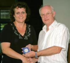 PhotoID:5252, Division of Human Resources' Dianne McKeiver is presented with her 15-year service medal from Vice-Chancellor Professor John Rickard.