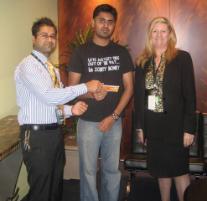 PhotoID:4106, Finance Manager Vikas Dhawan,  student Varun K Bhardwaj and Campus Director Barbara Abou-Lehaf