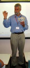 PhotoID:12393, Dr Bob Newby brings real practice into the classroom during the Science in Schools program. 