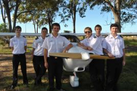 PhotoID:10860, Looking the part - CQUniversity aviation students show off their new uniforms.