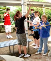 PhotoID:5223, Last years Siemens Science experience students build a structure from paddle pop sticks with Dr Fae Martin from the Engineering department at CQU Mackay 