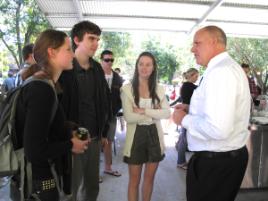 PhotoID:11167, Scott chats with L-R Emily Delaney (Education); Ian Star (Medical Science) and Amanda Bacon (Business/Accounting)