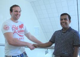 PhotoID:10185, Ben is congratulated by his former lecturer 'Aman'